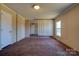 Spacious bedroom with an open layout, neutral walls, and lots of natural light at 828 Carver St, Shelby, NC 28152