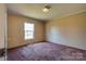 Bedroom featuring a window for natural light and neutral walls and carpets at 828 Carver St, Shelby, NC 28152