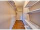 Walk-in closet with organized shelving, offering ample storage space at 828 Carver St, Shelby, NC 28152