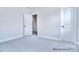 Neutral bedroom featuring a large closet and neutral carpet at 000 Millstream Rd # 149, Denver, NC 28037