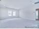 Bonus room with neutral carpet, recessed lighting and multiple windows at 000 Millstream Rd # 149, Denver, NC 28037