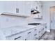 This well-appointed kitchen boasts sleek countertops, stainless steel appliances, and ample storage at 000 Millstream Rd # 149, Denver, NC 28037