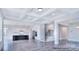 Open concept living room and kitchen area showcases modern finishes and lots of natural light at 000 Millstream Rd # 149, Denver, NC 28037