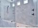 Shower featuring gray tile, a built-in seat, and a shower niche at 000 Millstream Rd # 149, Denver, NC 28037