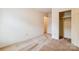 Bright bedroom offers neutral carpet and features a closet for storage at 1007 Wentworth Dr, Kannapolis, NC 28081