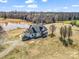 Expansive country estate featuring a charming home, serene pond, and vast acreage at 107 Sunderland Dr, Shelby, NC 28150