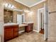 Bathroom featuring a glass shower, soaking tub, and double sinks at 107 Sunderland Dr, Shelby, NC 28150