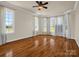 Bright and spacious living room with hardwood floors, recessed lighting, a ceiling fan, and large windows at 107 Sunderland Dr, Shelby, NC 28150