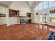 Bright living room with fireplace and large windows, creating a cozy and inviting atmosphere at 107 Sunderland Dr, Shelby, NC 28150