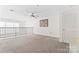Spacious bedroom with neutral carpeting, a ceiling fan, ample lighting and modern design at 1133 Metropolitan Ave # 310, Charlotte, NC 28204