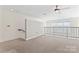 Cozy bedroom with access to a balcony, offering scenic views and natural light at 1133 Metropolitan Ave # 310, Charlotte, NC 28204