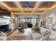 Stylish living room with coffered ceilings and backyard views at 131 The Point Dr, Mooresville, NC 28117