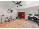 Spacious exercise room with weights, desk area, and natural light at 13215 Claysparrow Rd, Charlotte, NC 28278