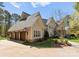 Charming home with a three-car garage and manicured landscaping at 13215 Claysparrow Rd, Charlotte, NC 28278