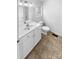 Bathroom featuring a vanity, mirror, and toilet at 134 Burke Cir, Mooresville, NC 28115