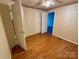 Bedroom with hardwood floors and wallpaper at 1420 28Th Sw St, Hickory, NC 28602
