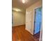 Bedroom showcases hardwood floors and neutral walls, enhanced by natural light and interior doors at 1420 28Th Sw St, Hickory, NC 28602