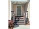 Cozy covered front porch with steps leading to the entrance, offering a warm welcome at 1420 28Th Sw St, Hickory, NC 28602
