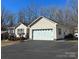 This home boasts an oversized two-car garage, complemented by a tidy yard at 1420 28Th Sw St, Hickory, NC 28602