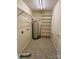 This laundry room features built in shelves for storage and a water heater at 1420 28Th Sw St, Hickory, NC 28602