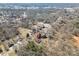 An aerial perspective of a home amidst a lush, wooded landscape, offering a sense of privacy at 1547 Kings Rd, Shelby, NC 28150