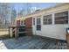 View of porch with door entry and stairs to the backyard at 1547 Kings Rd, Shelby, NC 28150