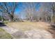 Large backyard featuring mature trees and plenty of space at 1547 Kings Rd, Shelby, NC 28150