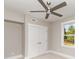 A bedroom featuring a double door closet, neutral walls, and a window view at 2069 Landry Ln # 233, Rock Hill, SC 29732