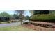 Community entrance sign surrounded by mature landscaping and lush green grass at 2069 Landry Ln # 233, Rock Hill, SC 29732