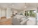 Open concept living room featuring hardwood floors and access to a covered porch at 2069 Landry Ln # 233, Rock Hill, SC 29732