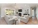 Spacious living area with fireplace and natural light from sliding glass doors at 2069 Landry Ln # 233, Rock Hill, SC 29732