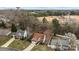 Aerial view of the home with a manicured front lawn and nearby baseball field, perfect for sports enthusiasts at 207 Pebble Creek Xing, Fort Mill, SC 29715