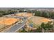 An overhead shot features the community baseball field, playground, and convenient parking at 207 Pebble Creek Xing, Fort Mill, SC 29715