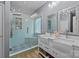 Beautiful bathroom featuring a glass-enclosed shower, dual vanities, and decorative mirrors at 207 Pebble Creek Xing, Fort Mill, SC 29715