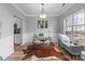 Home office area with plenty of natural light, neutral colors, and space to work at 207 Pebble Creek Xing, Fort Mill, SC 29715