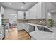 Bright kitchen with stainless steel appliances, white cabinetry, and eat in space at 207 Pebble Creek Xing, Fort Mill, SC 29715
