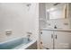 Bathroom features tiled shower, vanity with sink, window and medicine cabinet at 222 Weldon Cir, Mount Holly, NC 28120