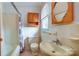 Bathroom features tiled shower, vanity with sink, window and medicine cabinet at 222 Weldon Cir, Mount Holly, NC 28120