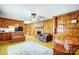 Cozy living room featuring a brick fireplace, built-in shelving, and an open-concept design at 222 Weldon Cir, Mount Holly, NC 28120