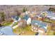 Located on quiet culdesac, the brick home has a manicured front lawn and mature trees at 2622 Rolling Ridge Dr, Hickory, NC 28602