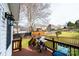 Outdoor patio with wood flooring, a grill, and backyard views at 2622 Rolling Ridge Dr, Hickory, NC 28602