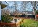 Backyard space features a firepit, seating, and lush landscaping at 2622 Rolling Ridge Dr, Hickory, NC 28602