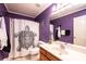 Eye-catching purple bathroom with turtle shower curtain at 2622 Rolling Ridge Dr, Hickory, NC 28602