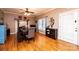An inviting dining area with hardwood floors and a cozy fireplace at 2622 Rolling Ridge Dr, Hickory, NC 28602