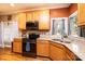 Well-lit kitchen featuring stainless steel appliances, granite countertops, and lots of natural light at 2622 Rolling Ridge Dr, Hickory, NC 28602