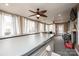 Beautiful sunroom with a hot tub, large windows, and a peaceful view at 2622 Rolling Ridge Dr, Hickory, NC 28602