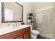 Well-maintained bathroom features a vanity with granite counters and modern glass enclosed shower at 3046 Denali Way, Rock Hill, SC 29732
