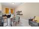 Bedroom with a cozy seating area, neutral walls, and natural light streaming through the window at 3046 Denali Way, Rock Hill, SC 29732