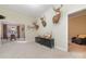 Inviting living room with elegant decor, neutral walls, and an open view into the dining area at 3046 Denali Way, Rock Hill, SC 29732