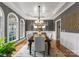 Elegant dining room with trey ceilings, chandelier, and wainscoting, perfect for hosting dinners at 308 Covington Xing, Weddington, NC 28104